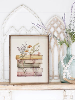Wood sign with stacked floral books illustration