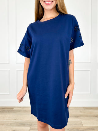Blue cotton-blend shift dress with short sleeves and embroidered eyelet details
