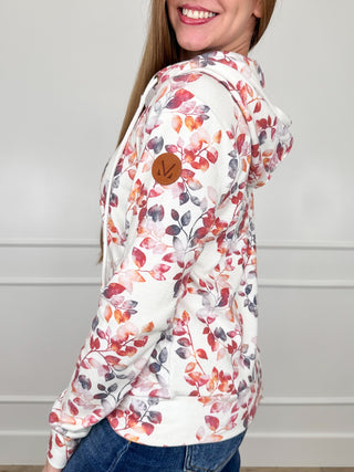 White floral print full-zip hoodie with hood and long sleeves, side view