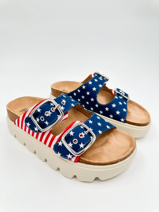 Canvas platform sandals with star-print straps, buckle closures, open toe