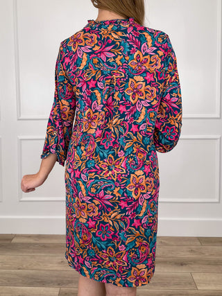Back-view teal paisley gabby dress with gathered waist and 3/4 sleeves