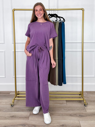 Smoky lilac high-rise wide-leg pants with drawstring waist and patch side pockets