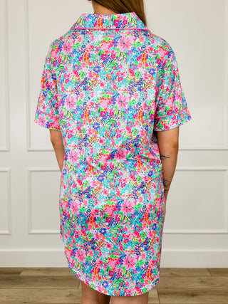 Back view of pink floral button-up sleep dress with short sleeves and collar