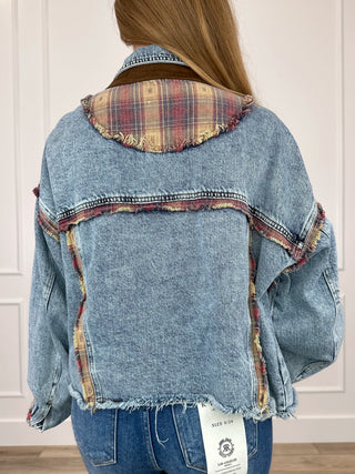Medium wash denim jacket with plaid collar, distressed hem and back view