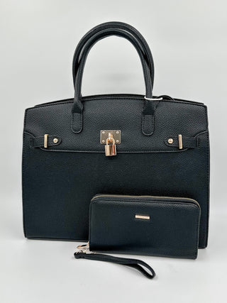 Black faux leather handbag with matching wristlet pouch and top handles