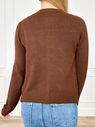 Brown knit cardigan back view with long sleeves and ribbed hem