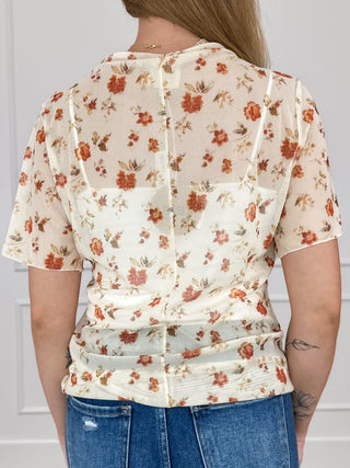 Cream floral sheer mesh short-sleeve top with back seam paneling and gathered waist
