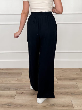 High-rise lightweight pants in dark navy, elastic waistband, full-length relaxed fit