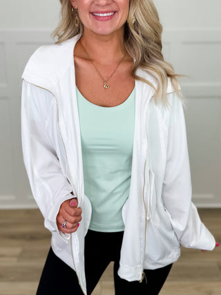 White lightweight hooded jacket with front zipper and long sleeves