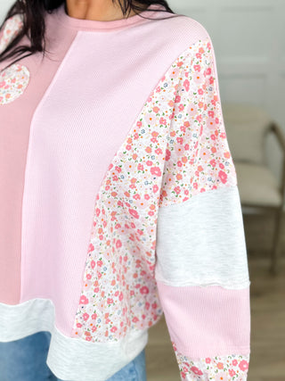 Long-sleeve cotton-blend top in pink with floral sleeve panels and gray hem band