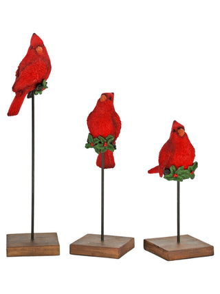 Red cardinal decor set with three standing bird figures on wooden bases
