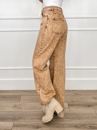 Bibi high-rise brown denim barrel-leg jeans with back yoke pockets and frayed cuffs