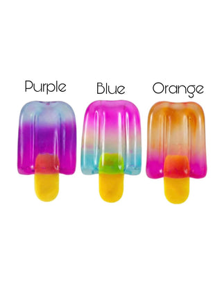 Squishy ice-pop toys in purple, blue, and orange with yellow handles