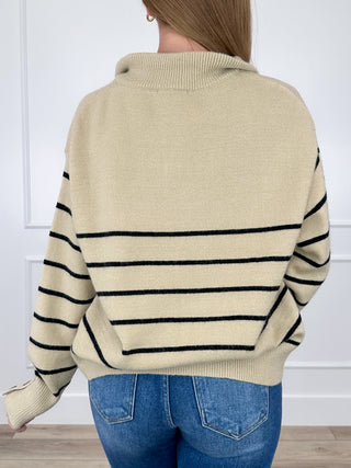 Tan knit long-sleeve hooded sweater back with navy stripe bands and relaxed fit