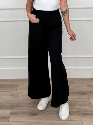 Tell Me This high-rise knit wide-leg pants in black, elastic waist and front patch pockets