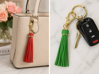 Gold clip-on tassel key rings, red and green tassels with attached keys/key fobs.