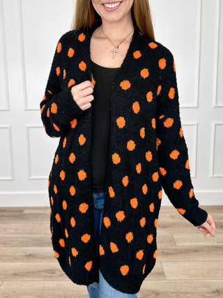 Reversible long-sleeve knit cardigan, black with orange dot pattern, open front