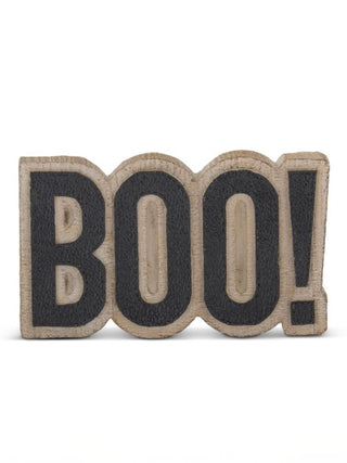 Wooden shelf sitter with carved letters BOO in dark gray on light wood