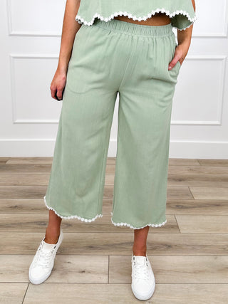 Sage high-rise cropped pants, scalloped hem and waist trim