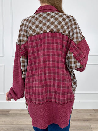 Berry plaid long sleeve button-up top with plaid back yoke and frayed hem