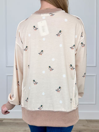 Cream long-sleeve top with back mallard and dot print, ribbed hem