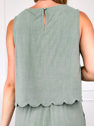 Green cropped sleeveless tank top, back keyhole and scalloped hem