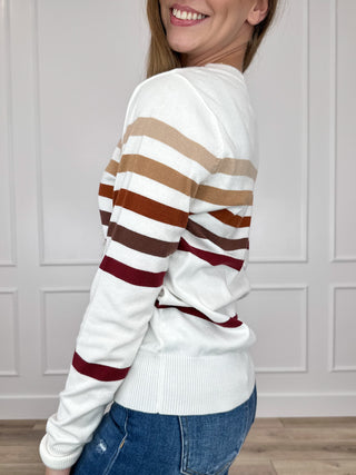 Ombre stripe knit sweater, long sleeves; white with rust, tan, maroon horizontal bands