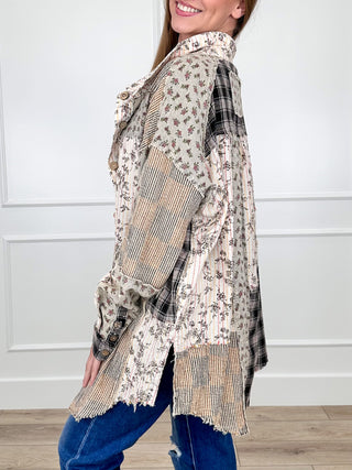 Patchwork long-sleeve tunic top with floral print, plaid yoke, and striped sleeve