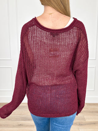 Wine-red knit long-sleeve sweater top, V-neck back view