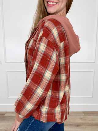Hooded flannel button-up shacket, brick red plaid with hood, long sleeves, side view