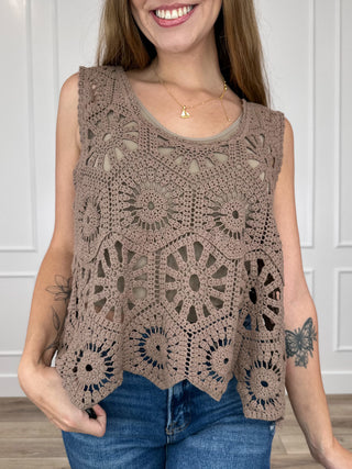 Brown crochet tank top with round floral motifs and scalloped hem, scoop neckline