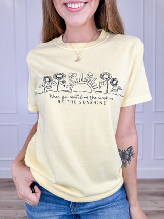 Yellow graphic cotton short-sleeve T-shirt with flowers and sunburst text