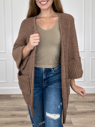 Brown open-front knit cardigan with 3/4 sleeves and textured chunky weave