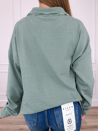 Green striped half-zip sweatshirt with long sleeves, back view