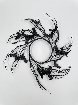 Black decorative masquerade mask with lace and feather-like accents