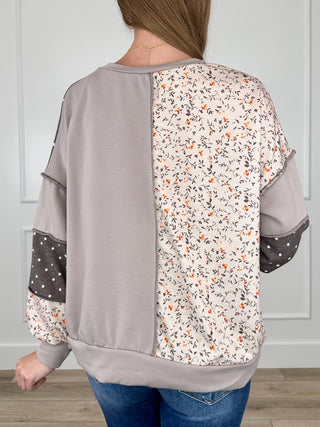 Brown knit long-sleeve back colorblock top with taupe center and floral print