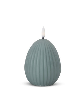 Muted green LED egg candle with ribbed texture and flame-like top
