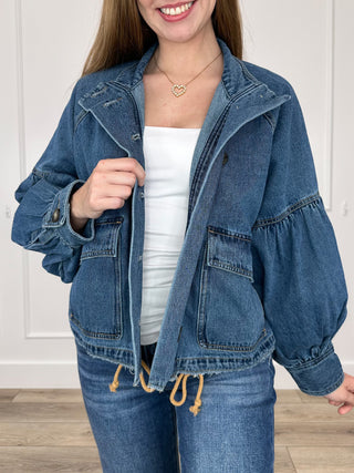 Medium-wash cotton denim jacket, long sleeves, button front with flap chest pockets