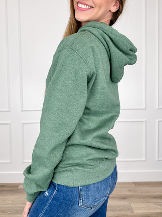 Green hoodie with drawstring hood, kangaroo pocket, shown from the side