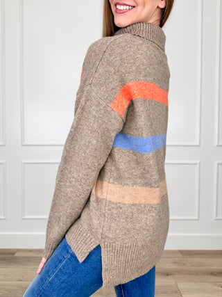 Brown knit long-sleeve sweater with multicolor stripe band and ribbed cuffs