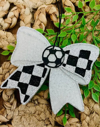 White felt sideline sparkle bow with black checker pattern and soccer ball emblem