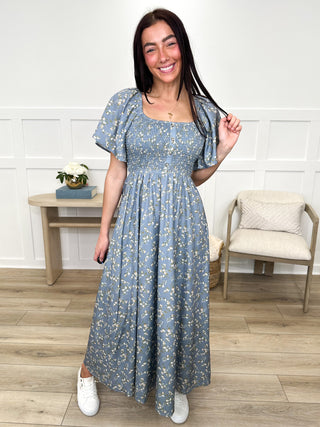 Women’s blue floral maxi dress with square neckline and short sleeves