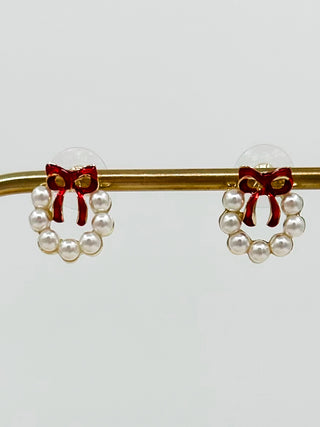 Gold stud earrings with red bow and faux-pearl wreath design