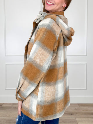 Camel and white plaid hooded jacket, long sleeves, front snaps, side profile