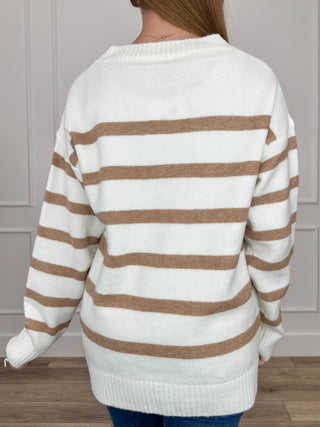 White knit crew-neck long-sleeve sweater with tan horizontal stripes, back view