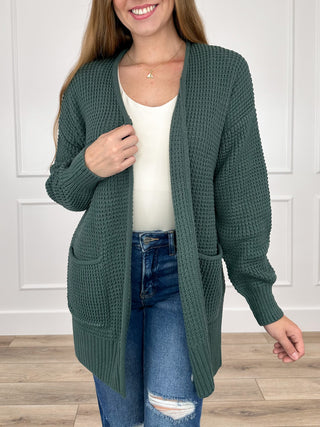 Teal knit long-sleeve cardigan with open front and ribbed hem and cuffs