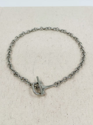 Silver-tone chain necklace with pendant-focused square and cross detail