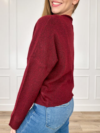 Wine red knit long-sleeve button cardigan with relaxed side profile