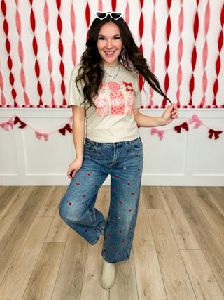 Girls denim jeans with red graphic tee, bow headband and heart details