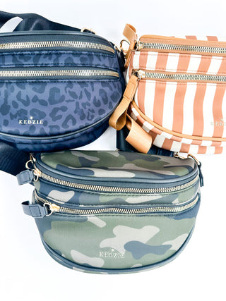 Neoprene crossbody bags: blue leopard, green camo, and orange striped styles with zip tops